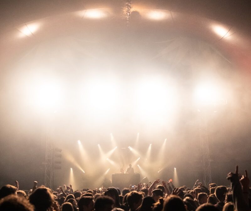 people near man on stage