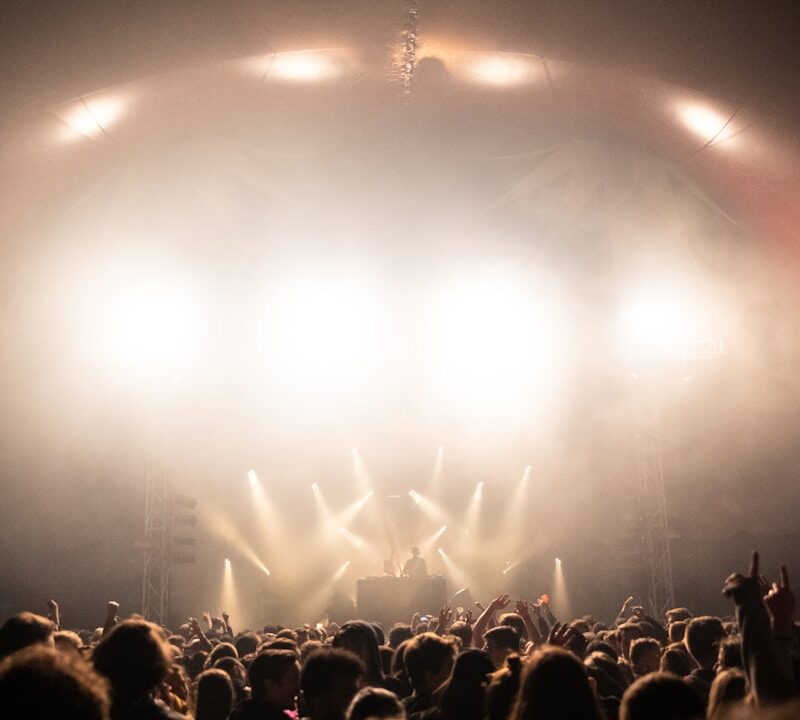 people near man on stage