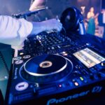 a person working on a dj turntable