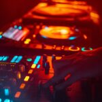 shallow focus photography person playing DJ controller